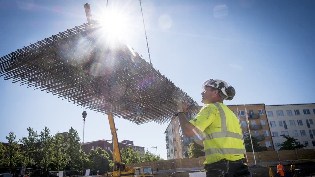 Byggarbetare på byggarbetsplats.