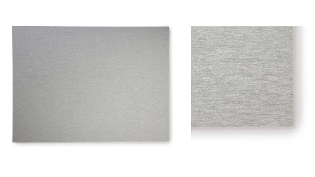 Grå kompaktpanel med lite struktur till stänkskiva.